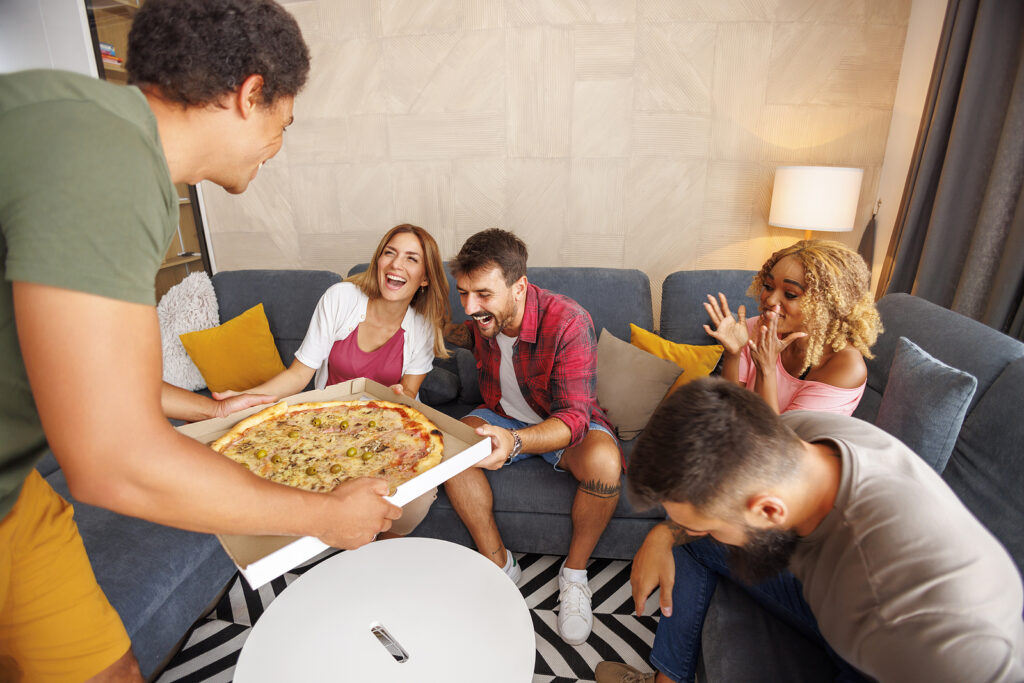 Friends having fun in a garden room