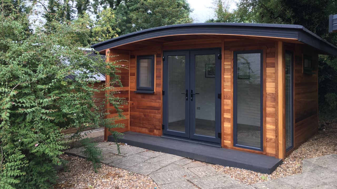 Showroom garden office garden room timber curved roof building