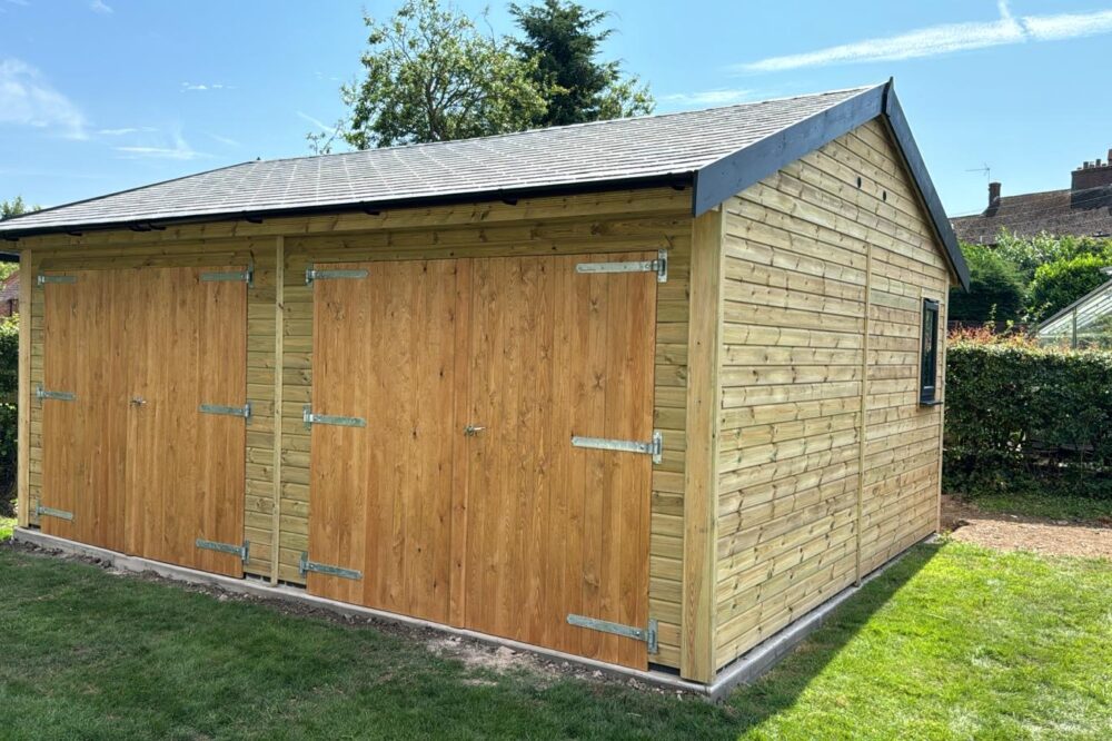 Double garage with a tiled roof