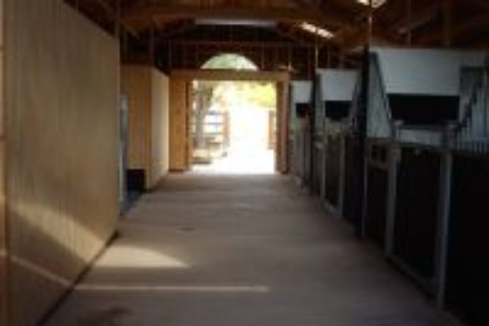 American barn with victorian style stables