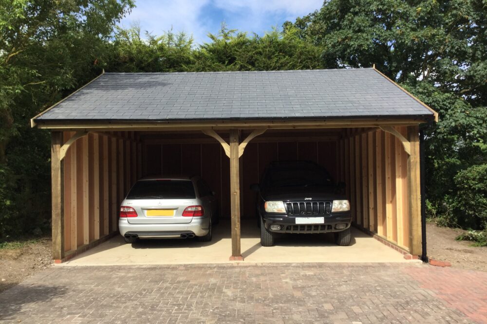 cart lodge with two parked cars