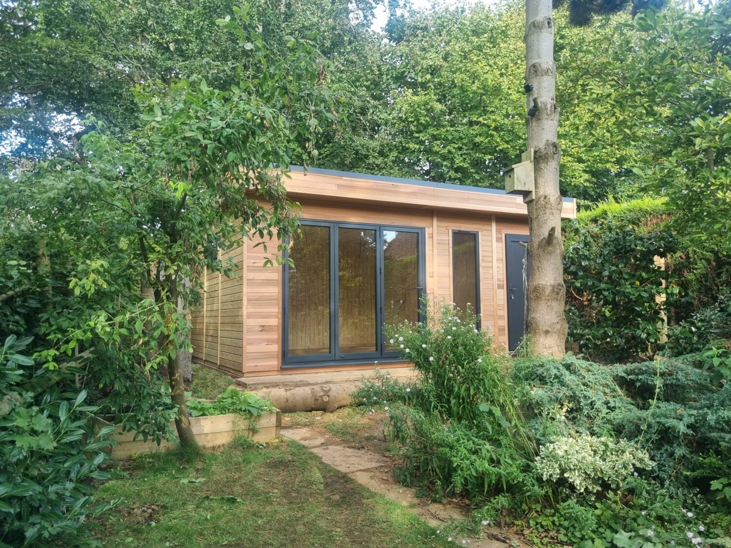 garden room in amongst trees