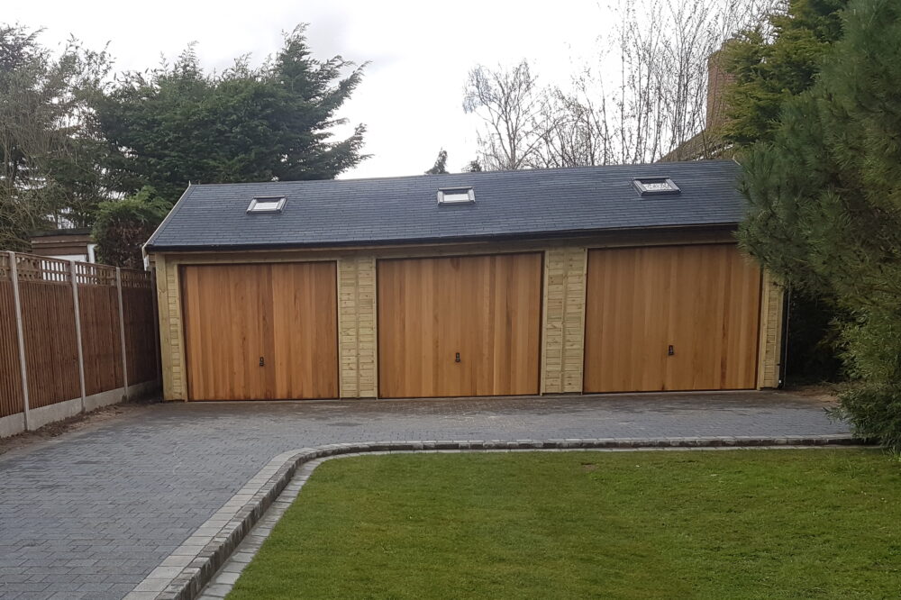 Three bay garage with cedar doors