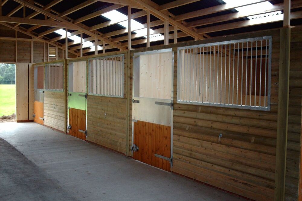 Inside of wooden stables