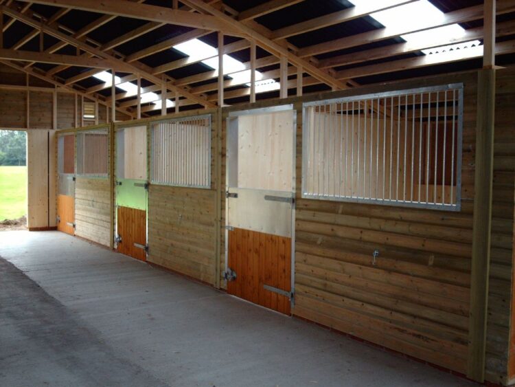 Inside of wooden stables