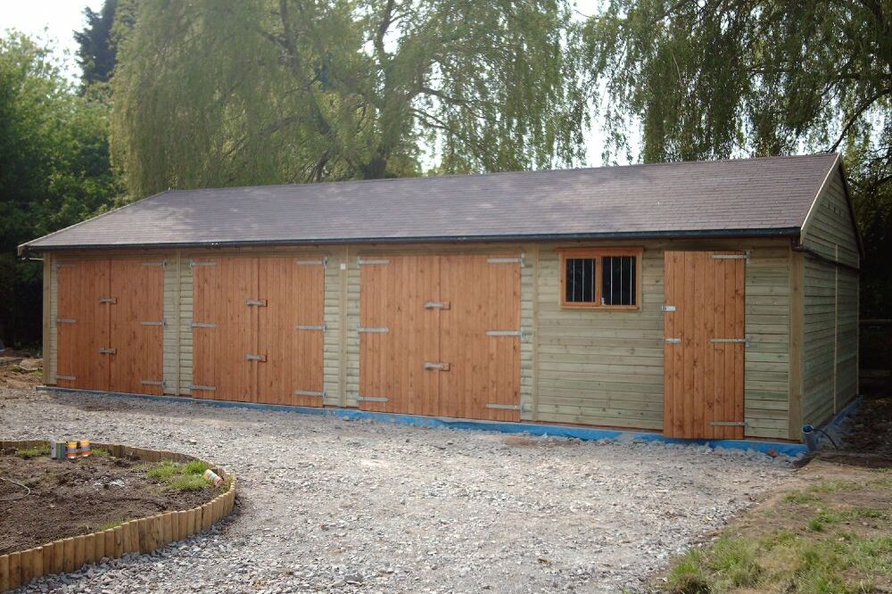 Triple Wooden Garages from Warwick Buildings