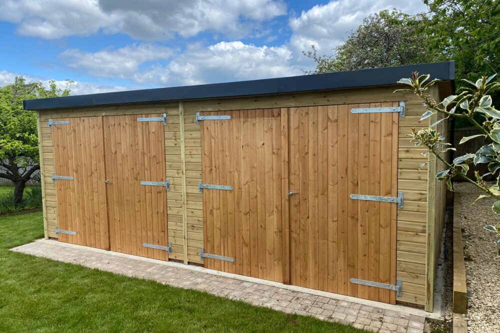 double door mono roof garage with black trim