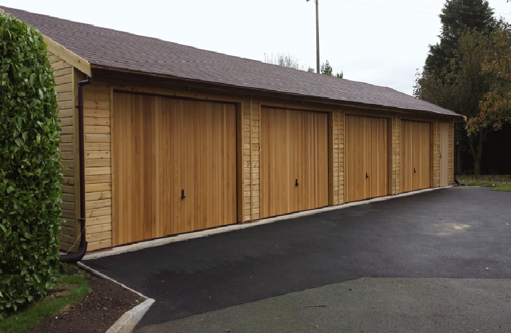 4 bay wooden garage with up & over doors