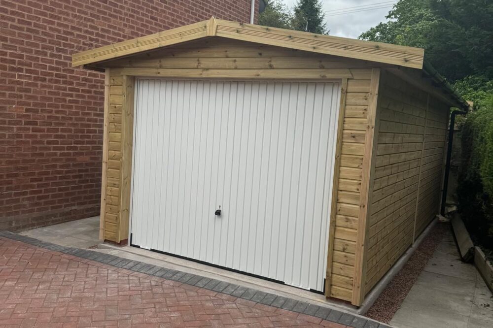 Single garage with a white door