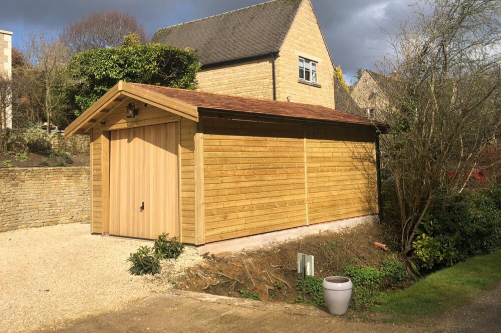 W wooden garage by www.warwickbuildings.co.uk