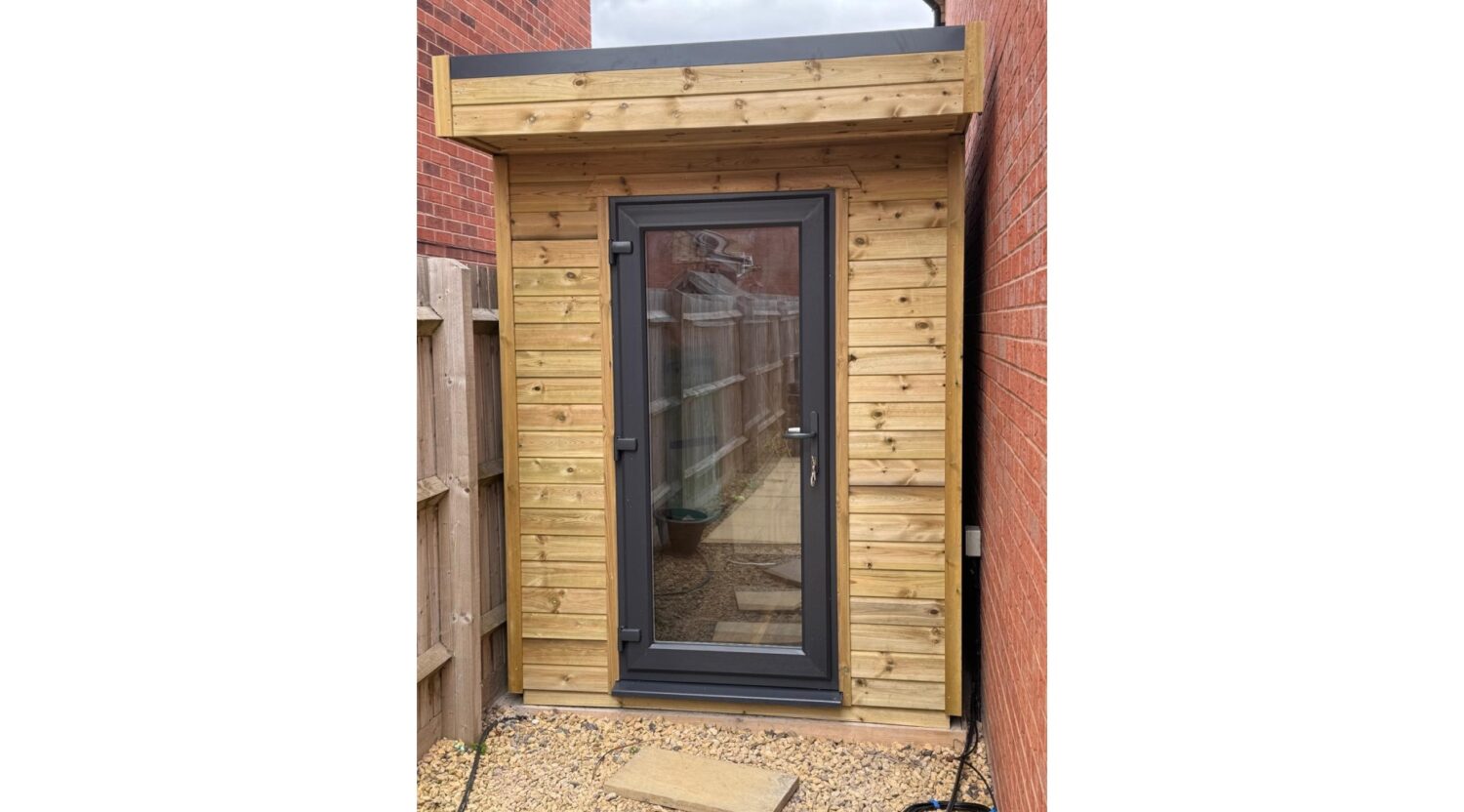 small-garden-office-next-to-house