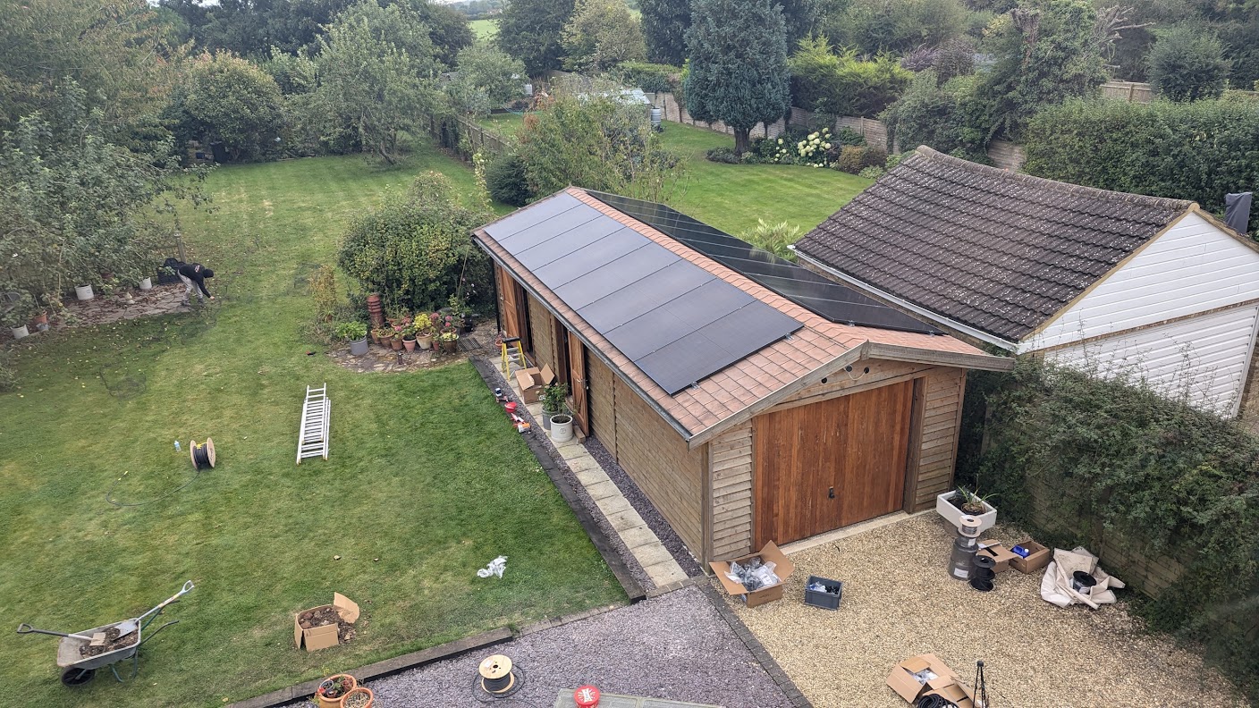 solar panels on a wooden garage