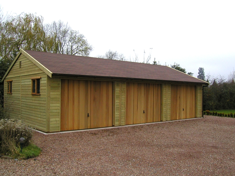 Wooden garage with cedar shingles