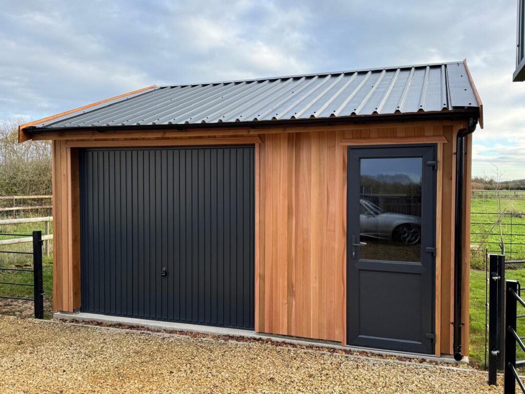 Single garage clad with cedar
